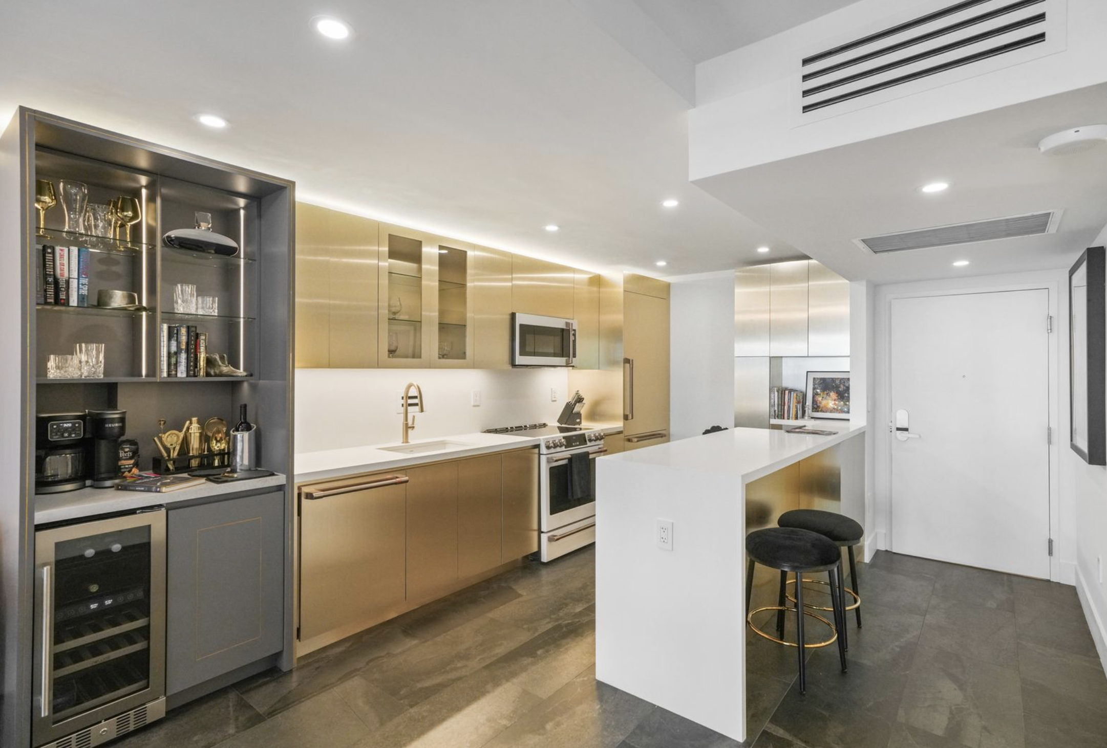 Miami kitchen and bar with metallic custom cabinetry